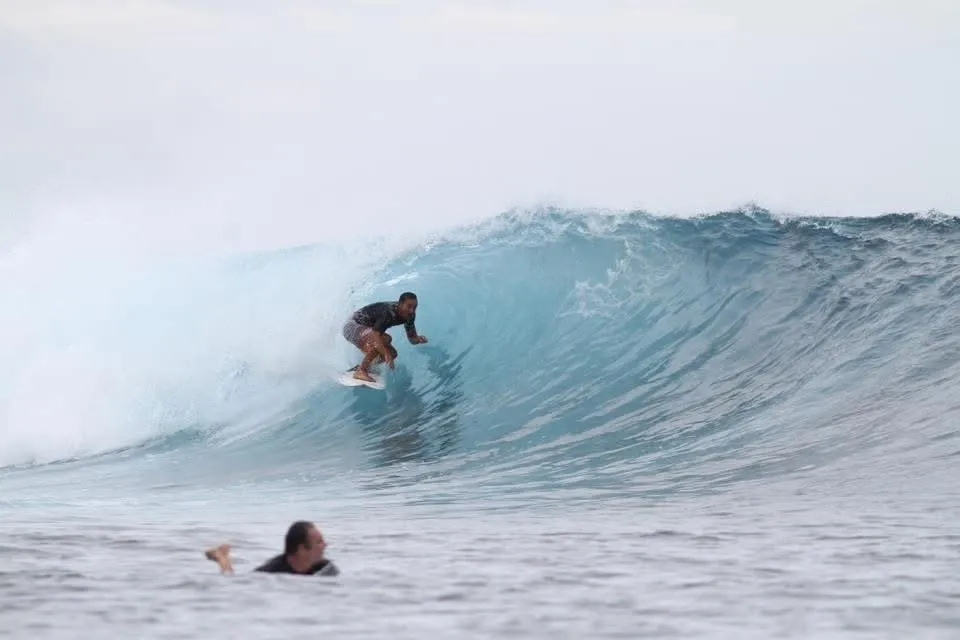 Mark Stephens surfing inside the barrel of a breaking wave in Hawaii